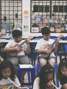 Music school singapore performance with students